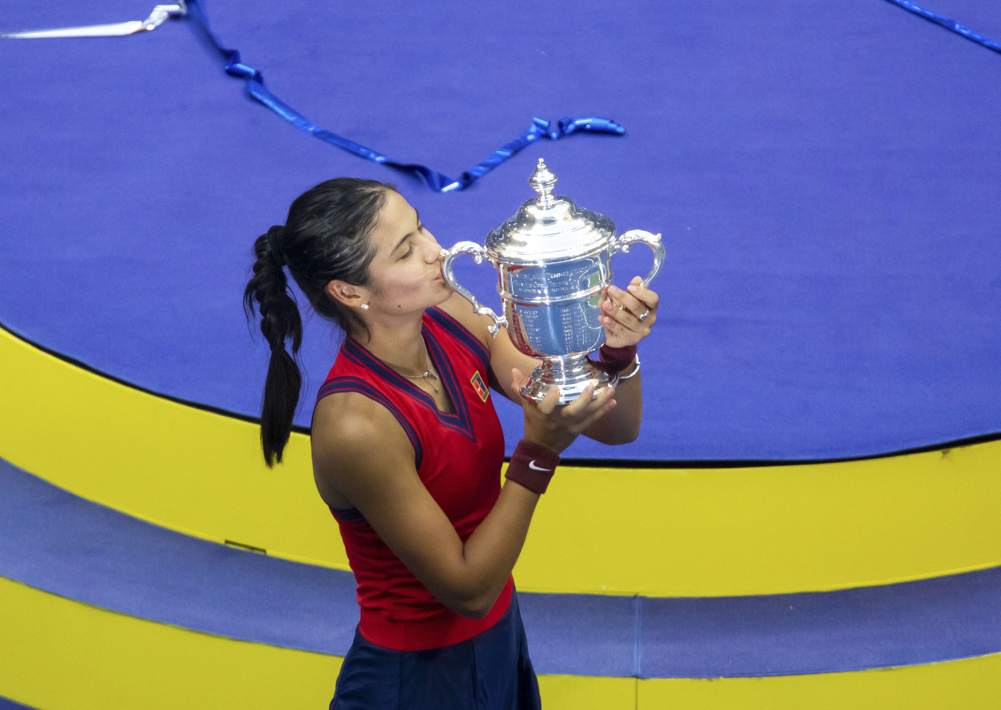 Great Britain’s Emma Raducanu kisses the trophy after winning the US Open women’s singles final (Michael Nagle/Xinhua via PA)