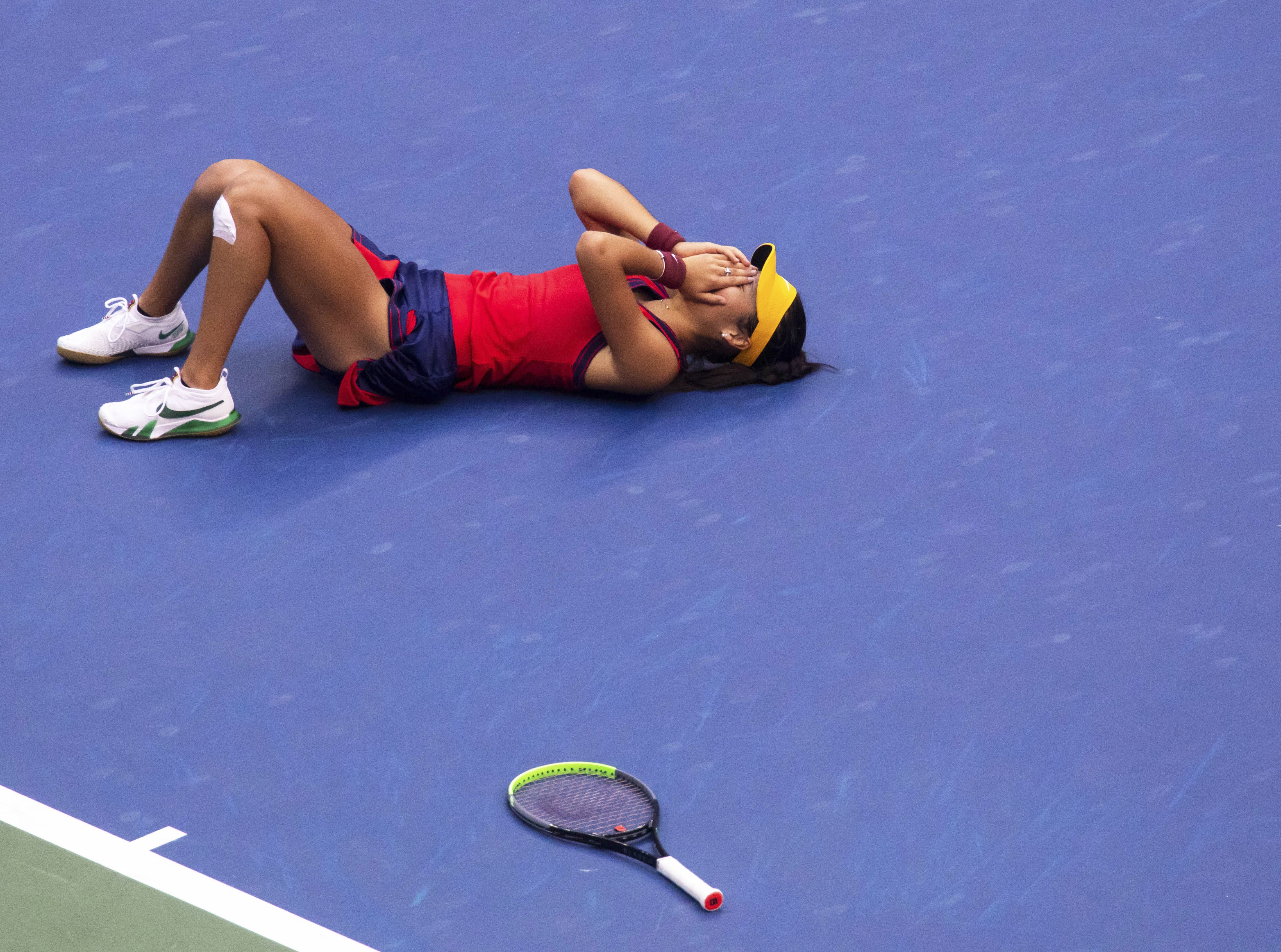 Emma Raducanu reacts after winning the women’s singles final on day 12 of the US Open (Michael Nagle/Xinhua via PA)