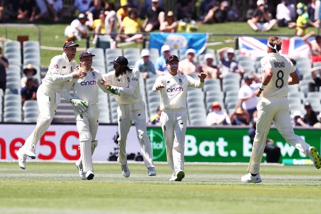 England players celebrate after Jos Buttler caught out Marcus Harris (Jason O’Brien/PA)