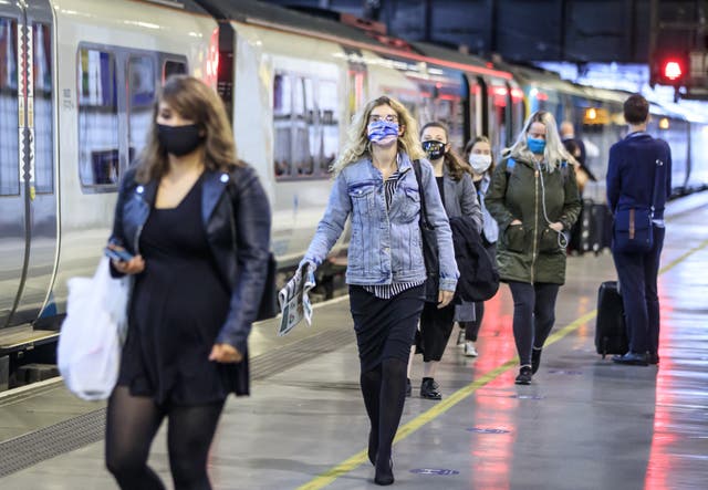 Andy Burnham said standard class ticket holders should be allowed to use first class carriages until rail services improve in the north (Danny Lawson/PA)