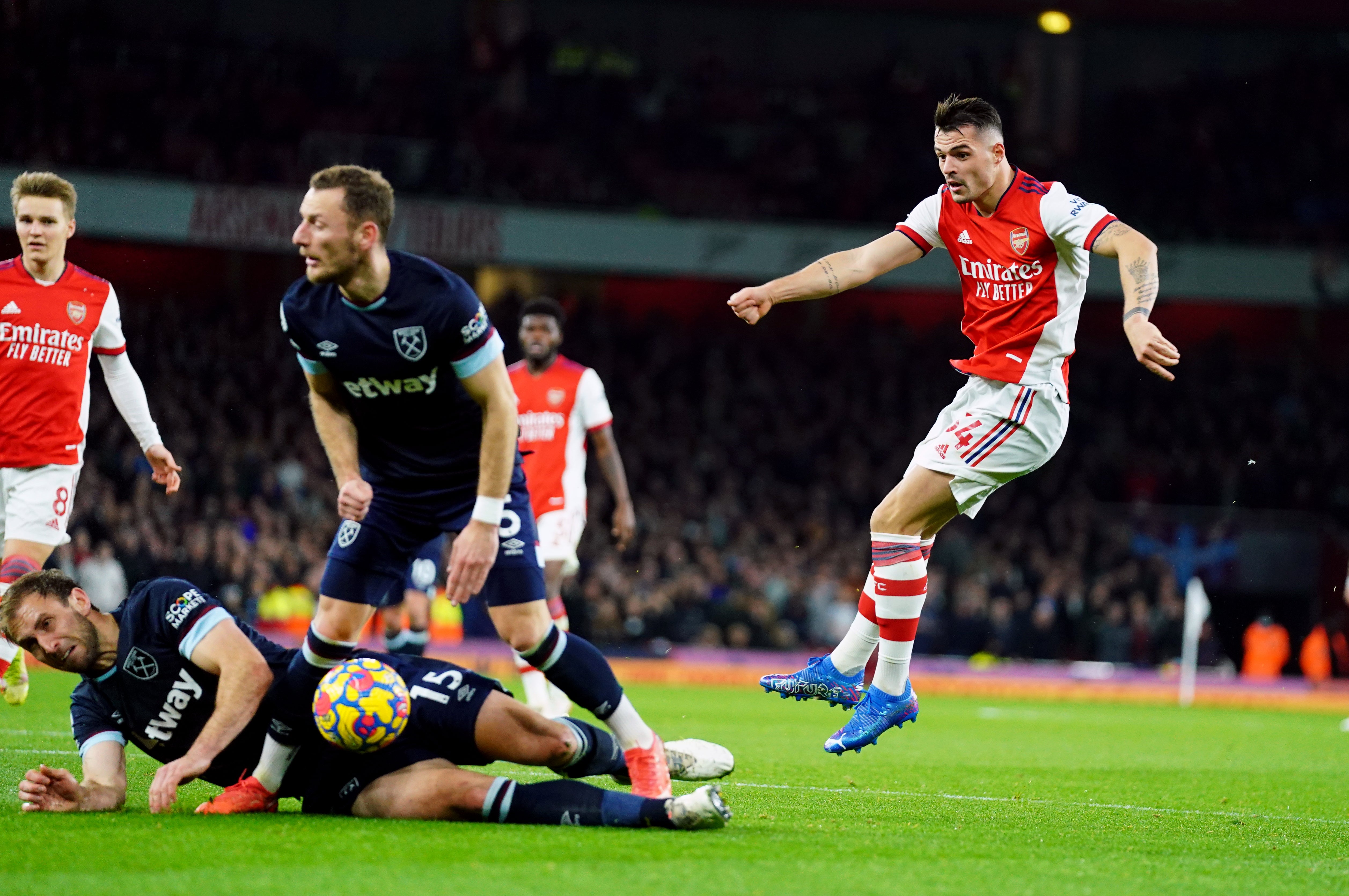 Granit Xhaka, right, is back in the Arsenal side (Nick Potts/PA)