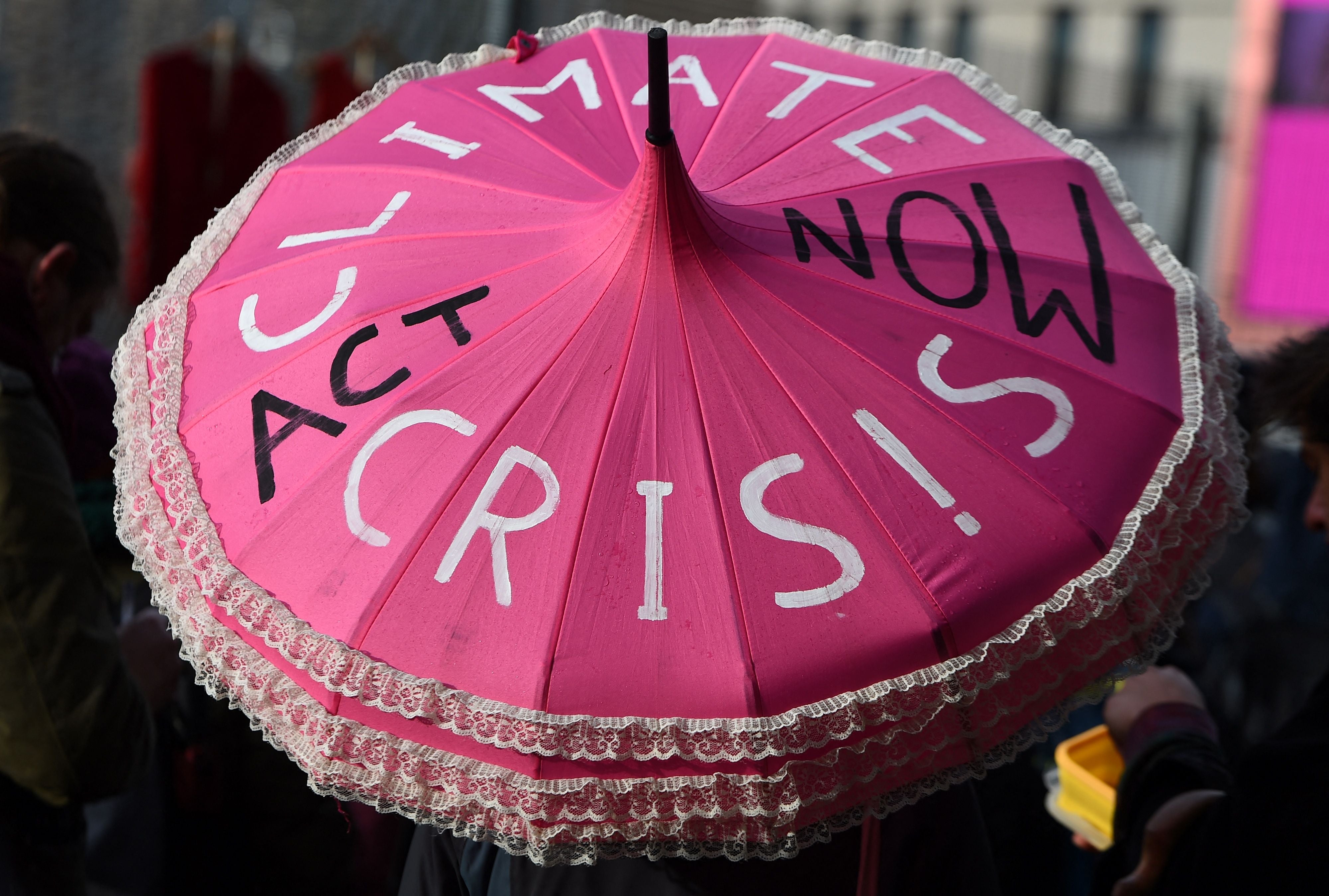 Climate activists demonstrate outside of the COP26 Climate Change Conference in Glasgow on November 12, 2021