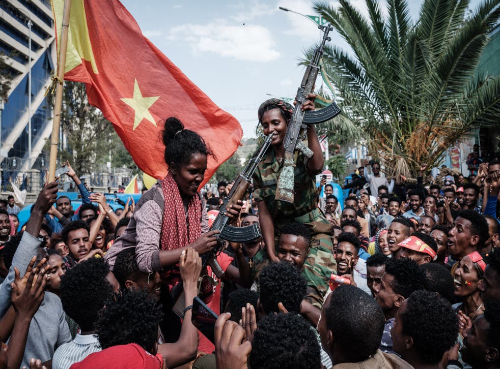 <p>Tigrayan rebels celebrate regaining territory from Ethiopian and Eritrean forces in June 2021 </p>