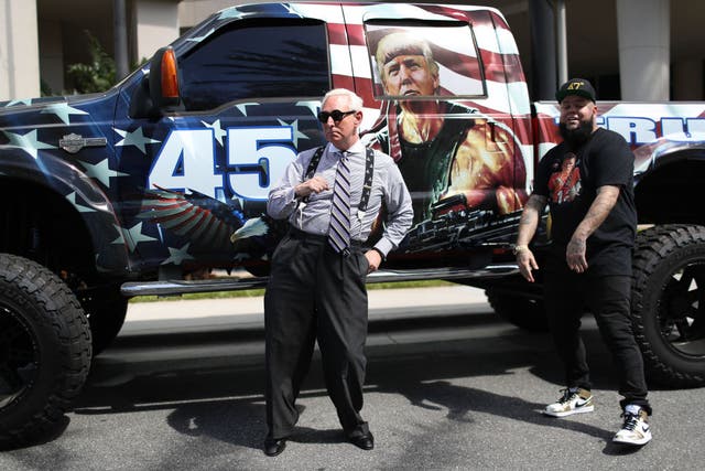 <p>Roger Stone, the longtime confidante of former President Donald Trump, poses in front of a truck</p>