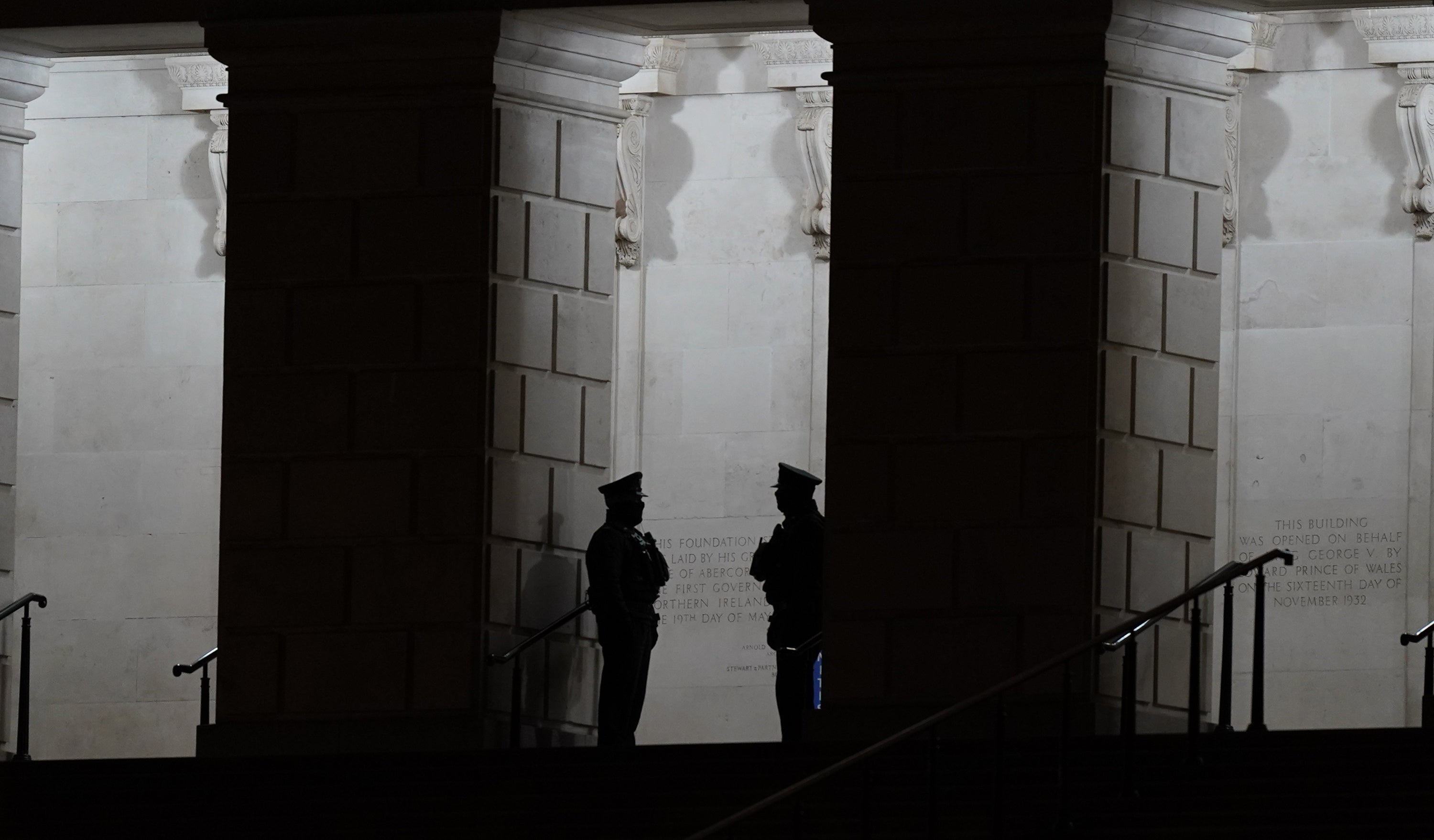 Two PSNI officers on duty outside the Stormont buildings in Belfast, Northern Ireland (PA)