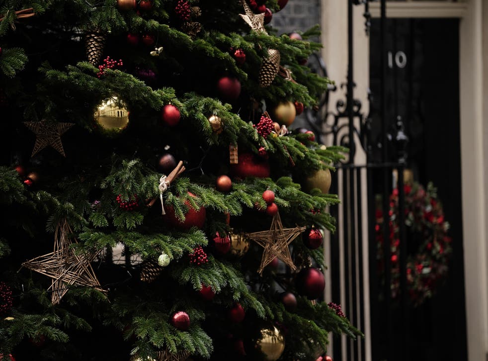 Ornaments and baubles hang from the Christmas tree outside 10 Downing Street, Westminster, London (Aaron Chown/PA)