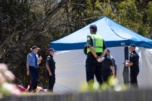 <p>File: Emergency services personnel work the scene of a deadly incident involved with a jumping castle at the Hillcrest Primary School in Devonport, Tasmania on 16 December 2021 </p>