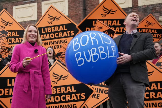 <p>Helen Morgan and Tim Farron celebrate the Lib Dems’ historic by-election victory in North Shropshire </p>