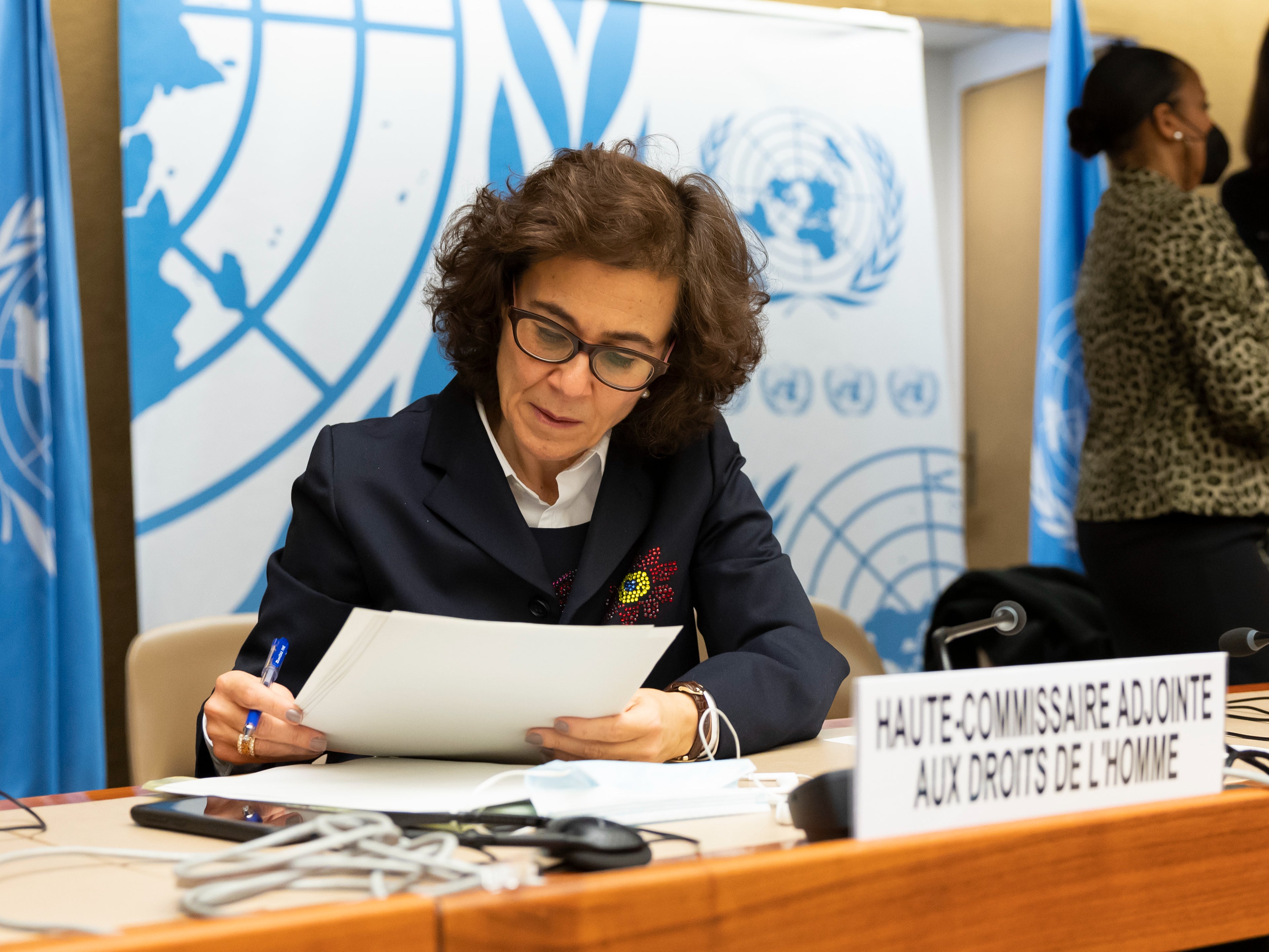 <p>The UN Deputy High Commissioner for Human Rights, Nada Al-Nashif, prepares for a session in Geneva, Switzerland, 17 December 2021</p>