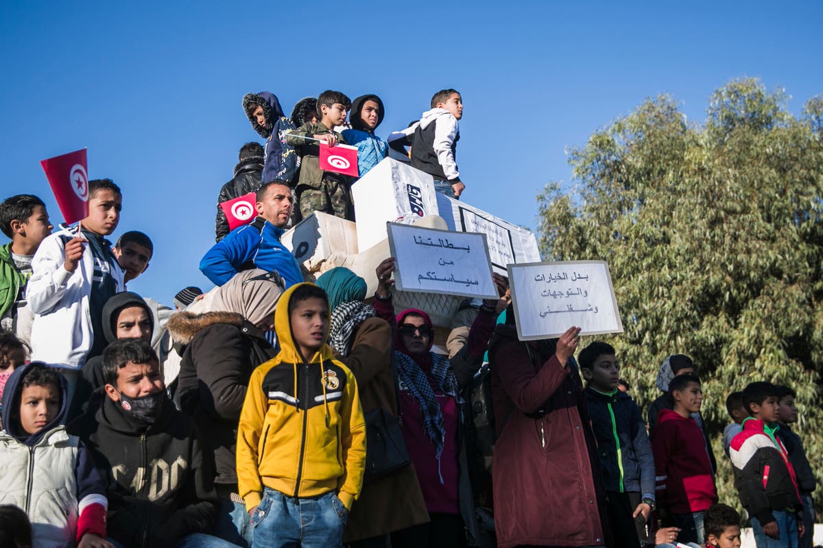 Celebration and protests mark Tunisia's new Revolution Day