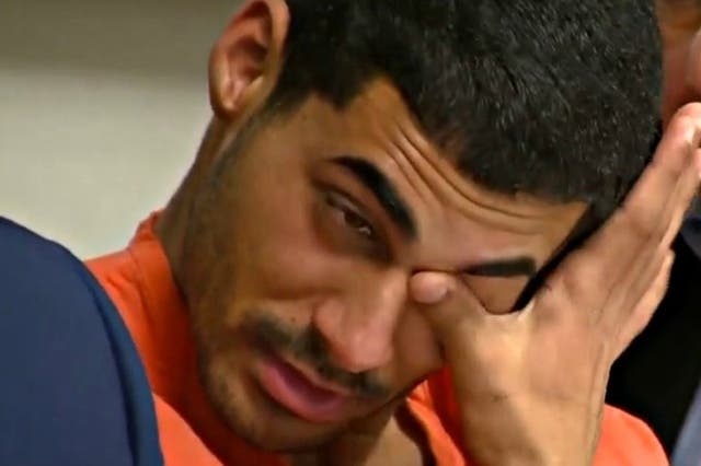 <p>Rogel Aguilera-Mederos wipes away tears in court where he was found guilty of 27 charges  </p>