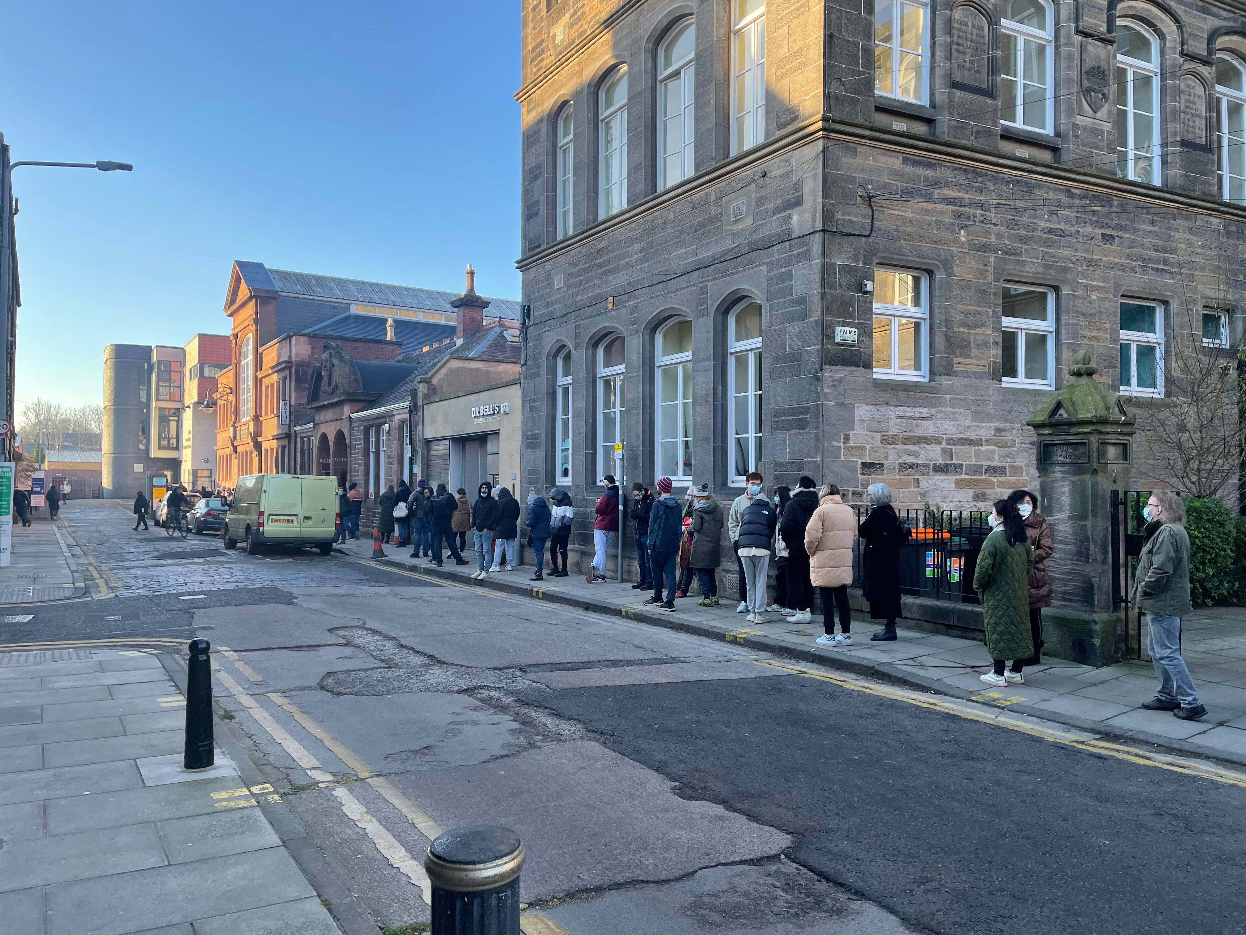 People were waiting hours to get their coronavirus vaccines at Leith Community Treatment Centre, Edinburgh (Dan Barker/PA)