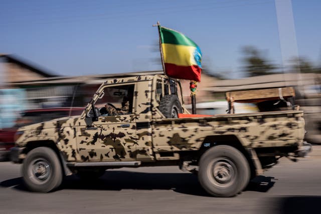 <p>File photo: A military vehicle with the Ethiopian national flag is seen in Kombolcha, Ethiopia, on 11 December 2021</p>