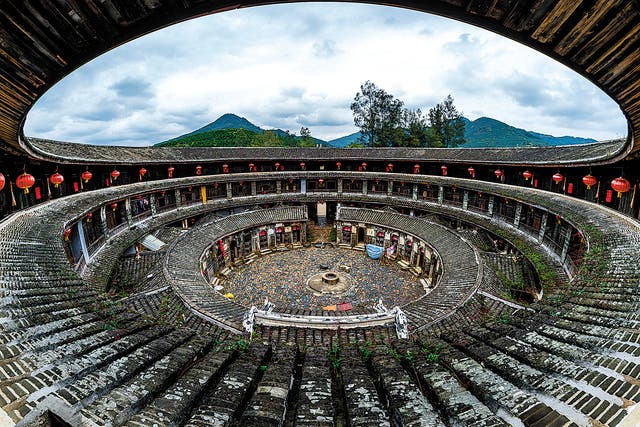 <p>A tulou in suburban Zhangzhou city, which used to be isolated from the outside world, is now a popular tourist attraction in Fujian province </p>