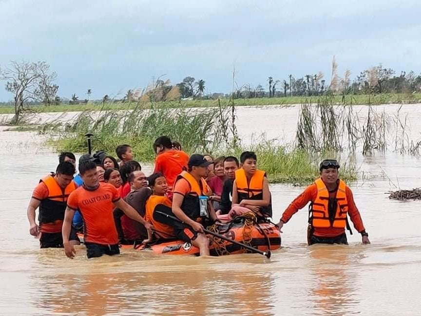 The Philippine coastguard rescues stranded residents
