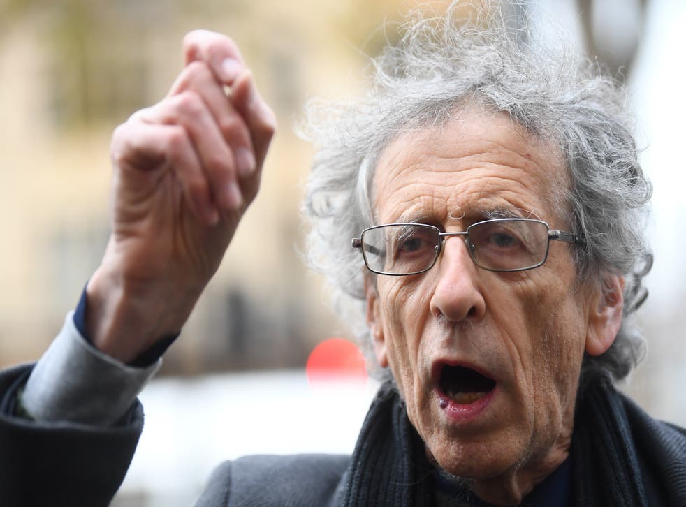 Piers Corbyn speaks while arriving at Westminster Magistrates’ Court, London (Victoria Jones/PA)