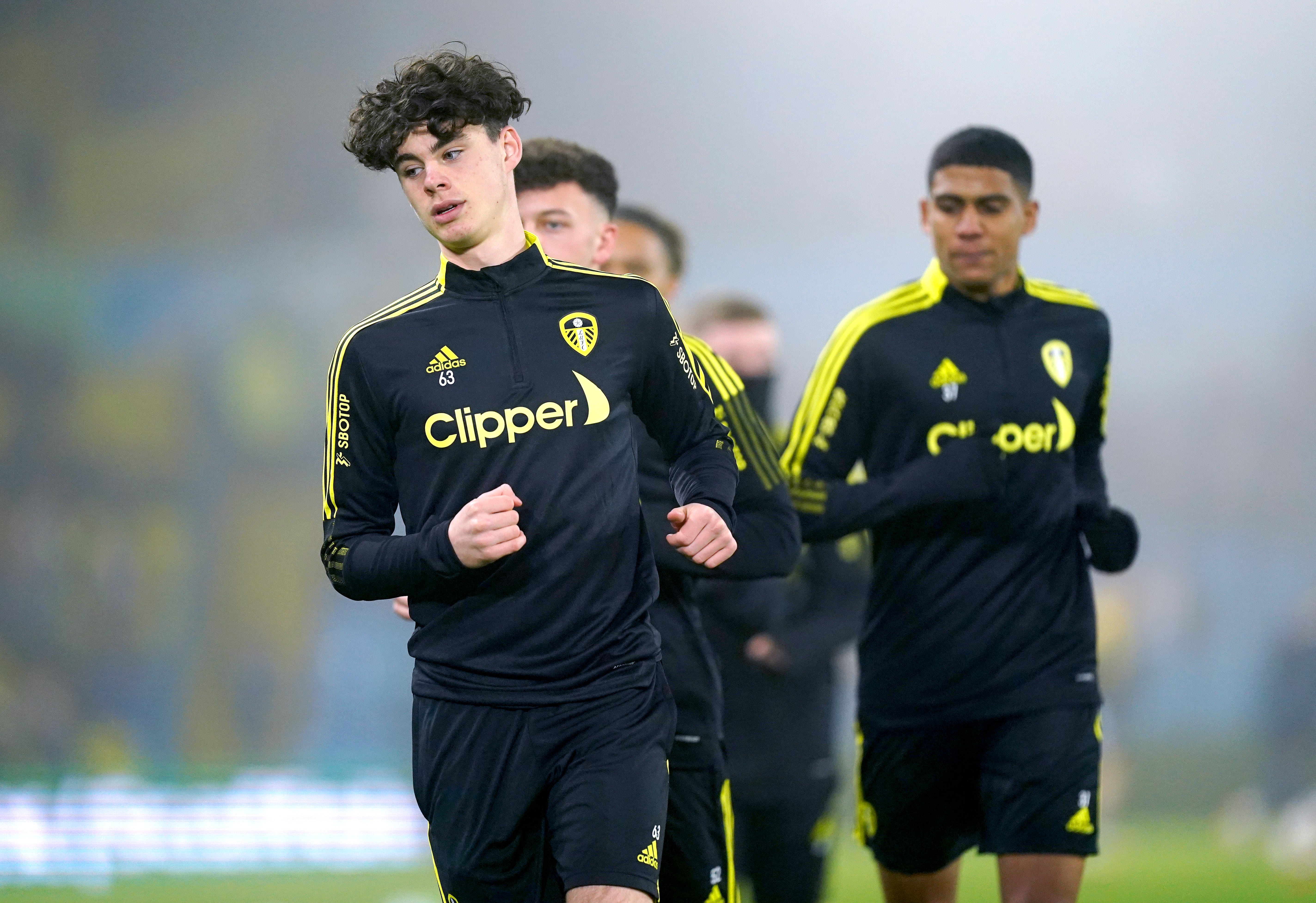 Leeds included 15-year-old Archie Gray, front, the great-nephew of Eddie Gray, on their bench (Mike Egerton/PA)