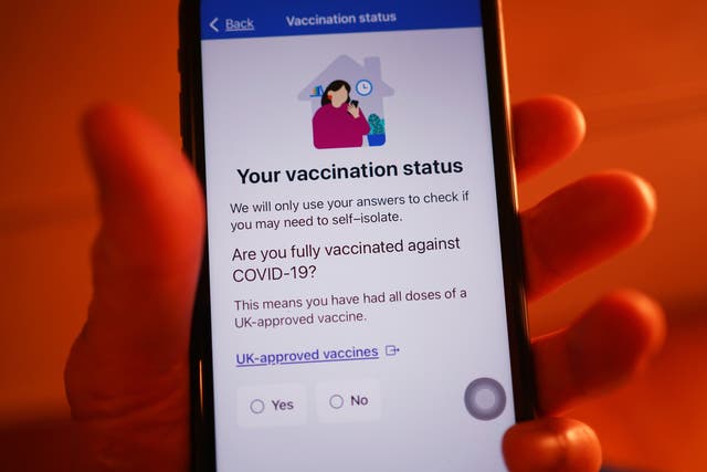 Questions asked by the NHS coronavirus contact tracing app to determine whether self-isolation is required (Yui Mok/PA)