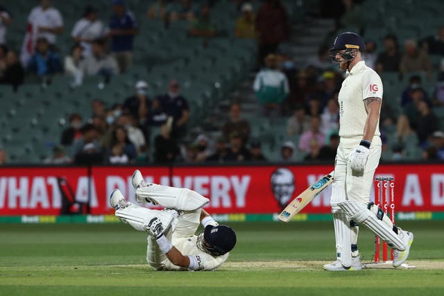 England are down and almost out in Adelaide (Jason O’Brien/PA)