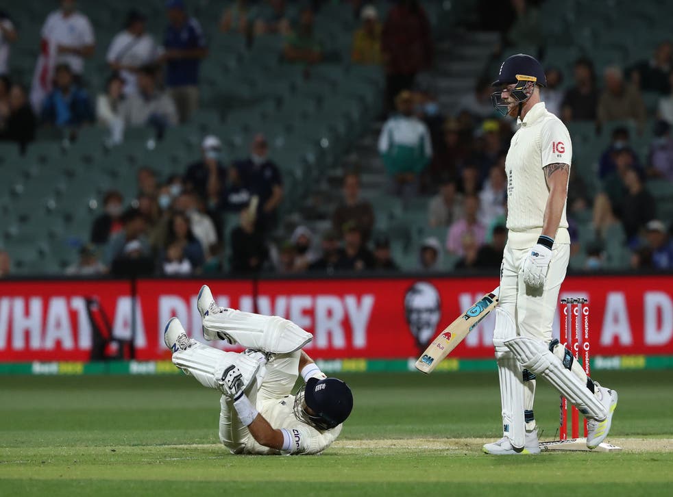 England are down and almost out in Adelaide (Jason O’Brien/PA)