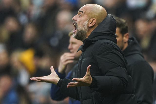 Manchester City manager Pep Guardiola is convinced there is more to come from his table-toppers (Owen Humphreys/PA)
