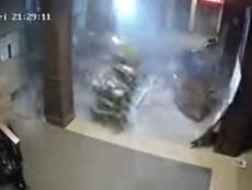 Surveillance video captures bank’s Christmas tree shaking before Kentucky tornado tore through building