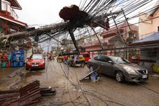 More than 200 dead after typhoon slams Philippines