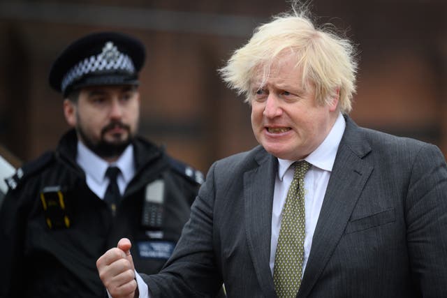 <p>Boris Johnson speaks with officers on a constituency visit to Uxbridge police station last week </p>