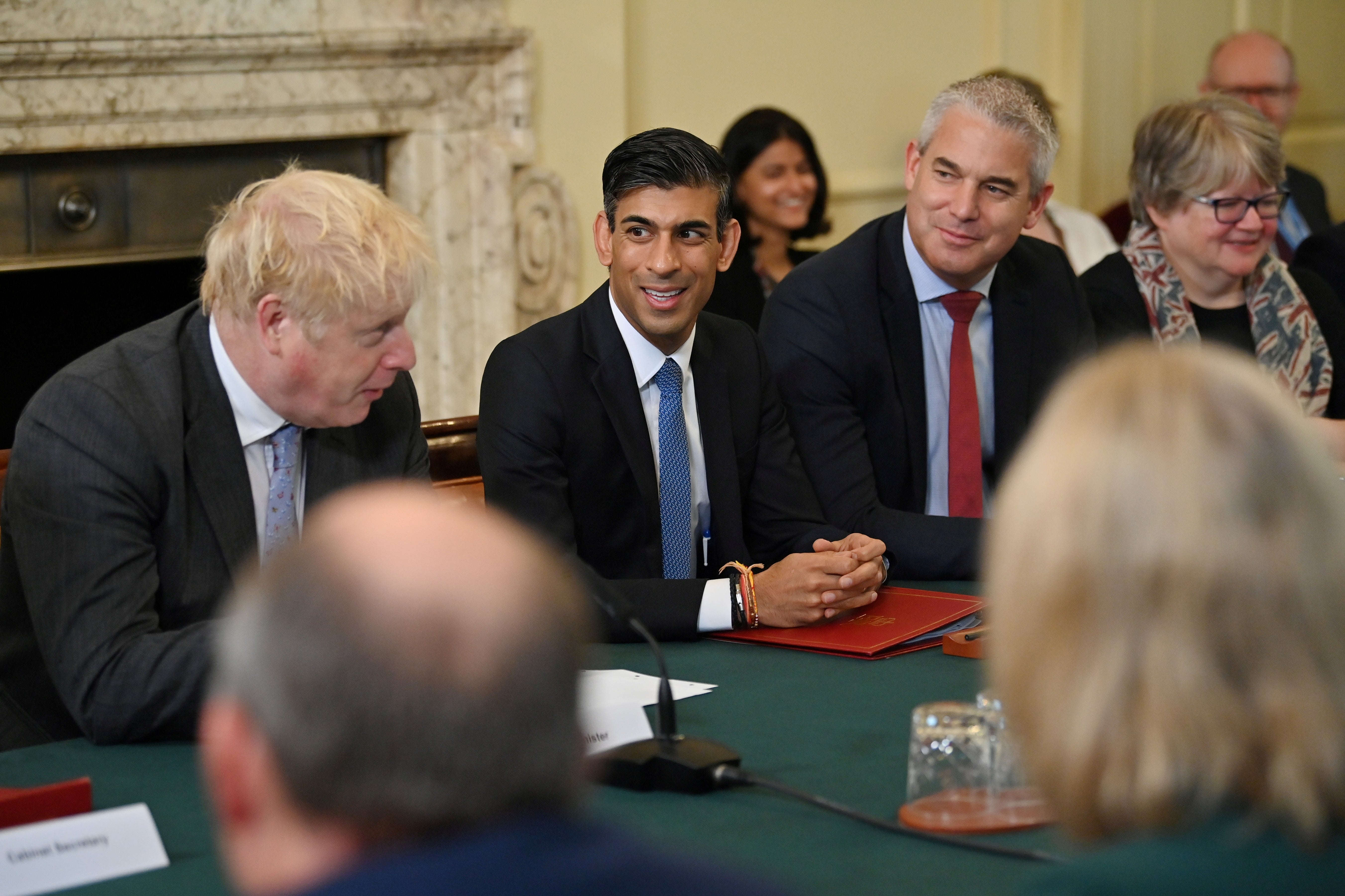 Smiling assassins? The PM speaks at a cabinet meeting