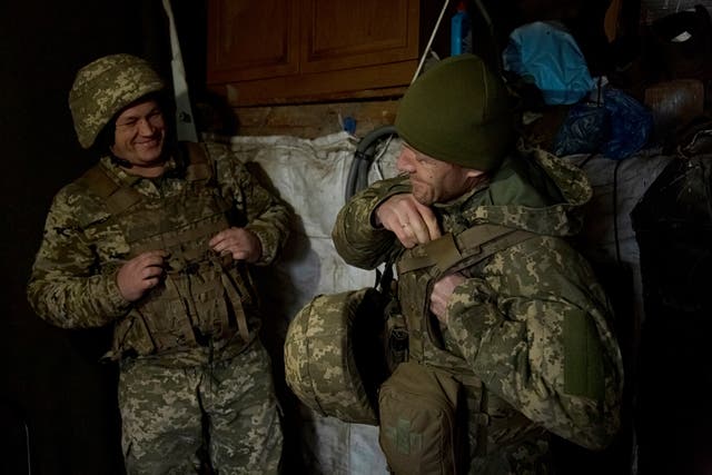 <p>Ukrainian soldiers in a dugout shelter in Krasnohorivka</p>