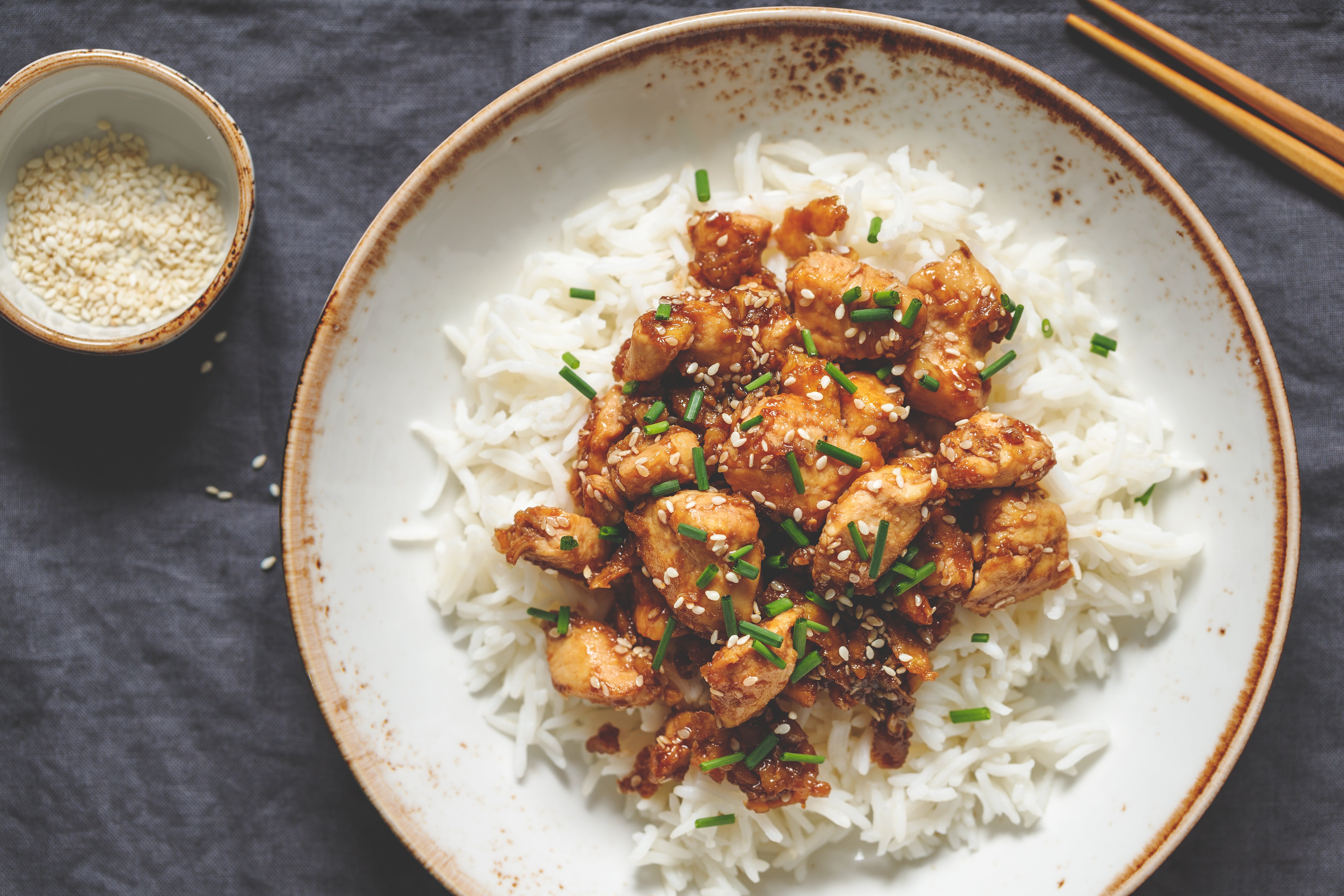 Chicken thighs, white pepper, chardonnay and 20 garlic cloves are all you need for this zinger of a one-pot meal