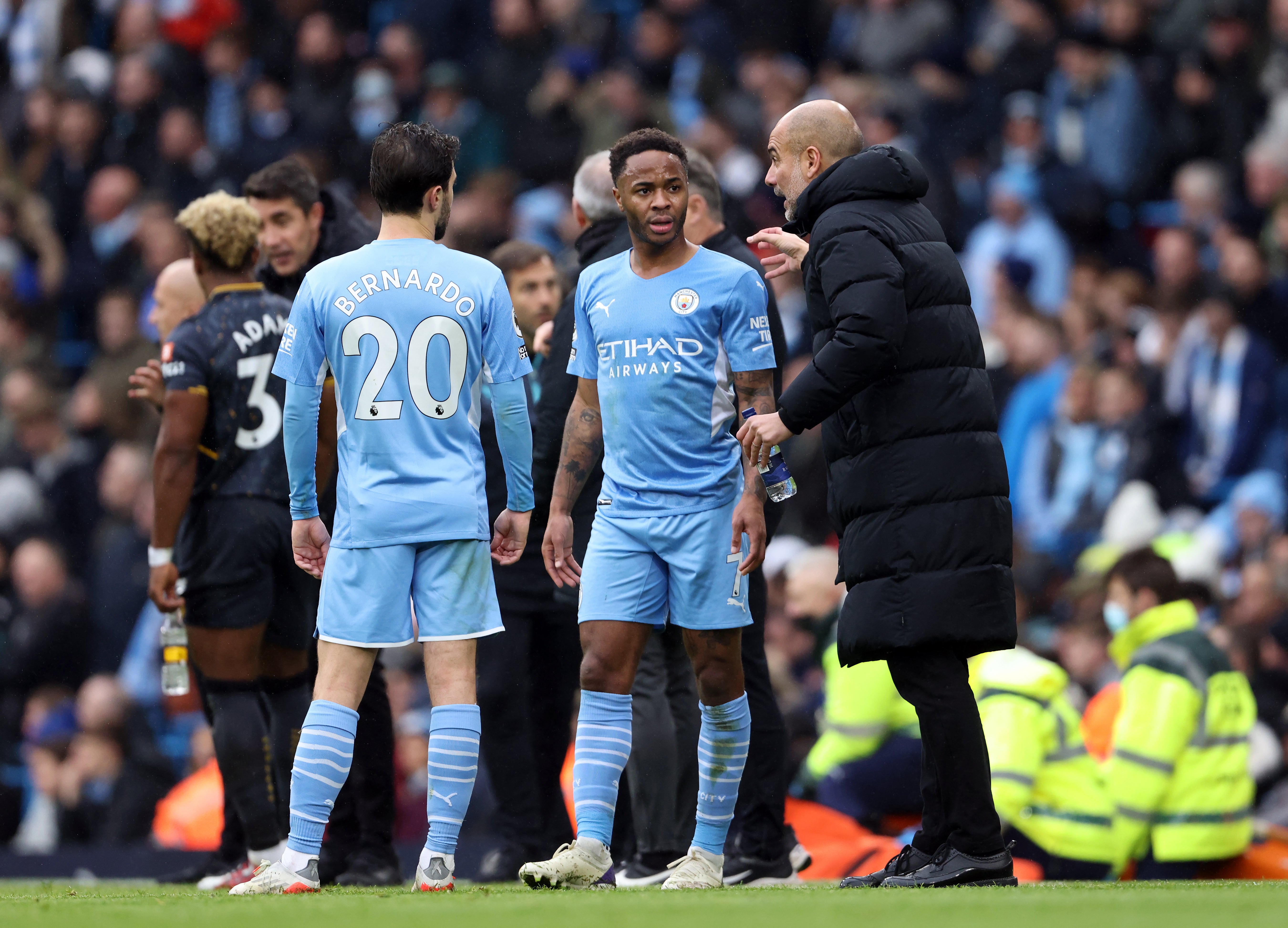 Sterling (centre) has been well managed by Guardiola (right) (Richard Sellers/PA)