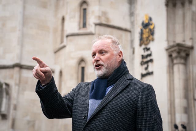 Former police officer Harry Miller speaks to the media outside the Royal Courts of Justice (PA)