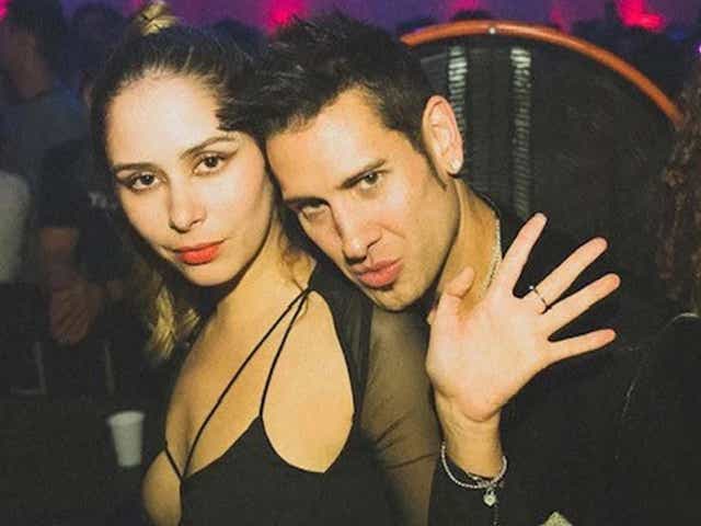 <p>Hilda Marcela Cabrales-Arzola, 26, poses with David Pearce at an after-hours warehouse party in downtown LA on 13 November 2021 </p>