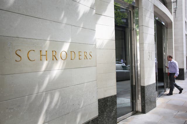 Schroders has agreed to buy a majority stake in Greencoat Capital (Philip Toscano/PA)