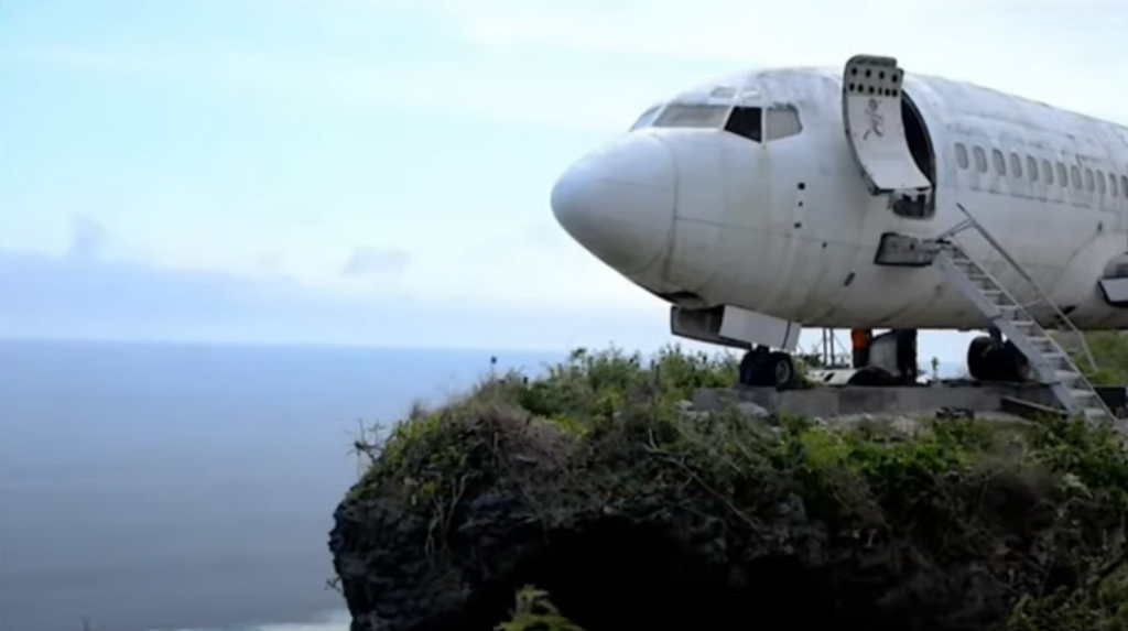 Disused Boeing 737 jet moved to Bali clifftop as tourist attraction