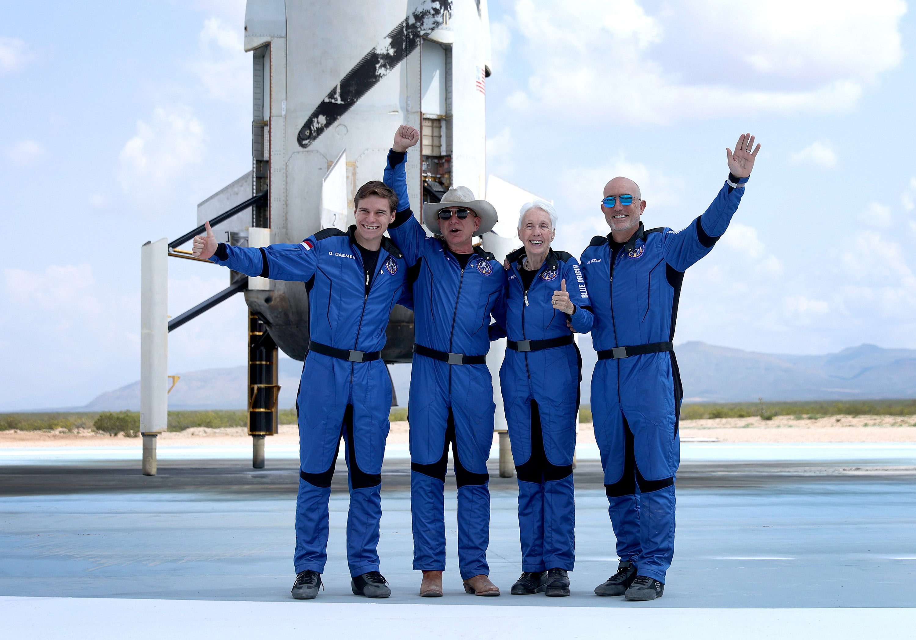 Oliver Daemen, Jeff Bezos, Wally Funk and Mark Bezos pictured after flying into space in the Blue Origin New Shepard