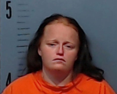 Casey Kennedy is pictured in her booking photo following her arrest for murder