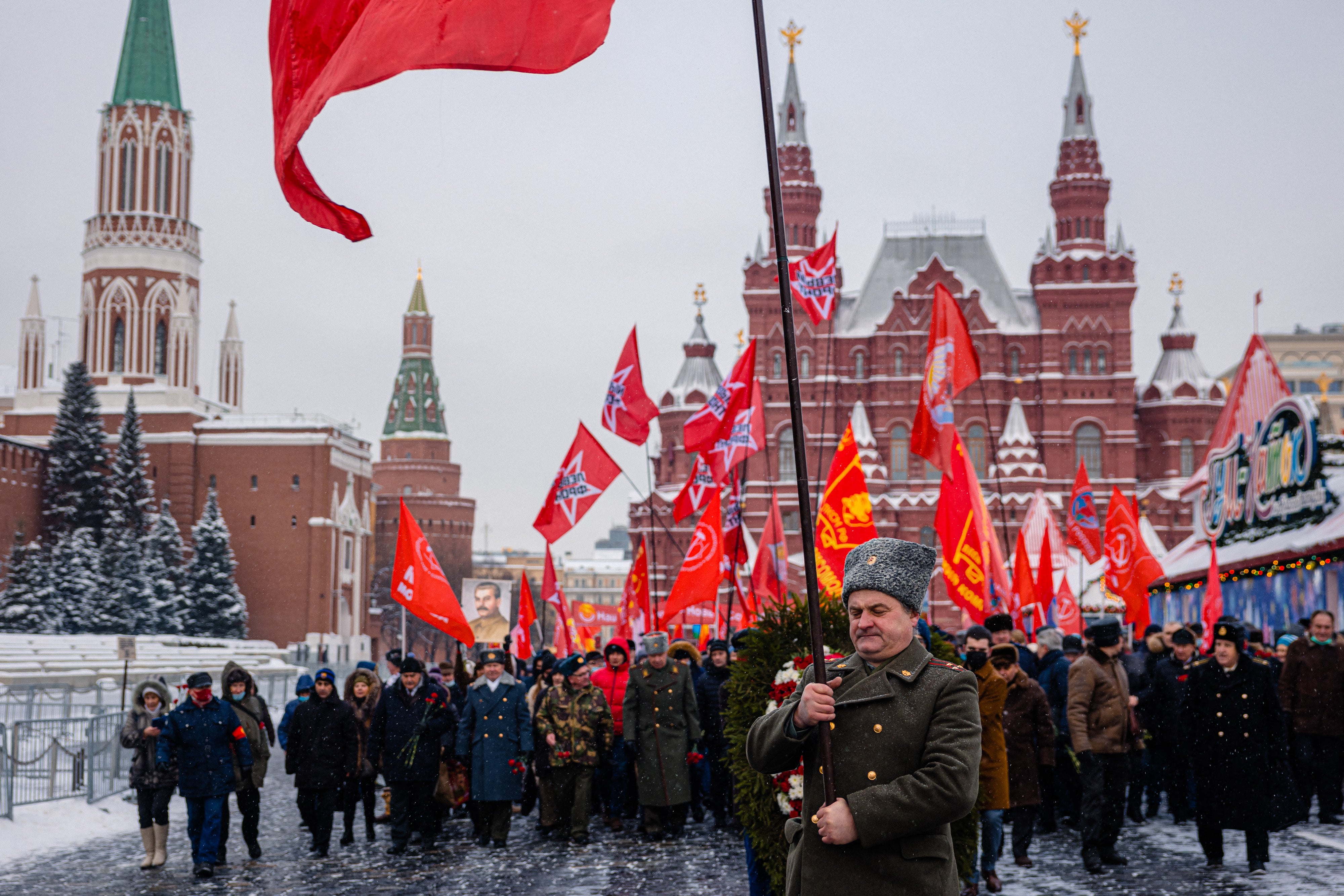 Communist party supporters march to lay flowers at Joseph Stalin’s tomb during the memorial ceremony