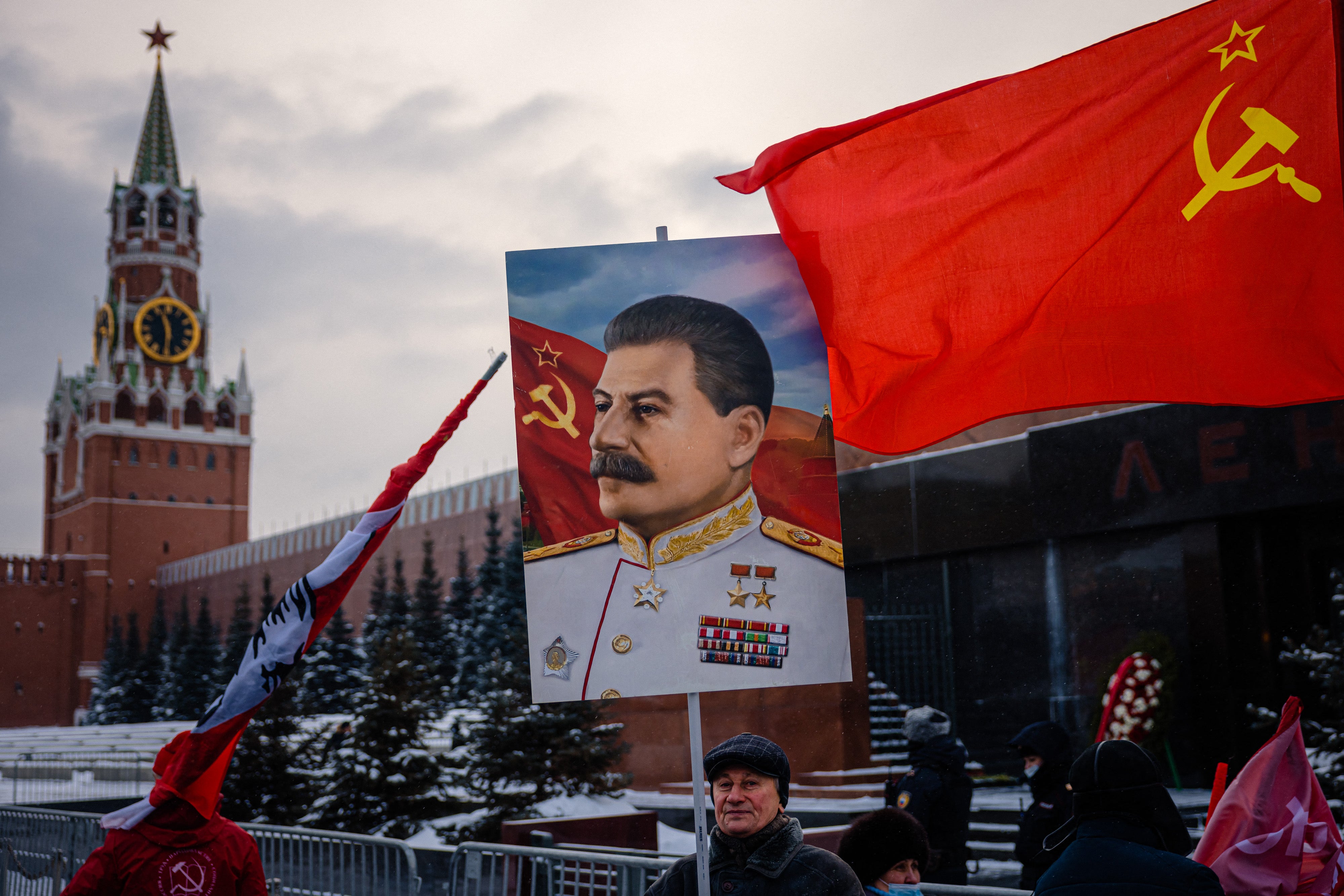 Communist party supporters attend a memorial ceremony to mark the 142nd anniversary of the late Soviet leader Joseph Stalin’s birth at Red Square in Moscow on 21 December