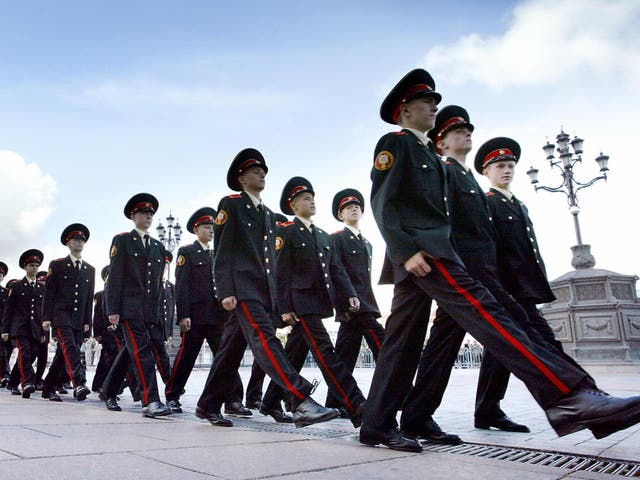 <p>Military school cadets in Moscow march outside the cathedral of Christ the Saviour during a ceremony marking the beginning of their education</p>