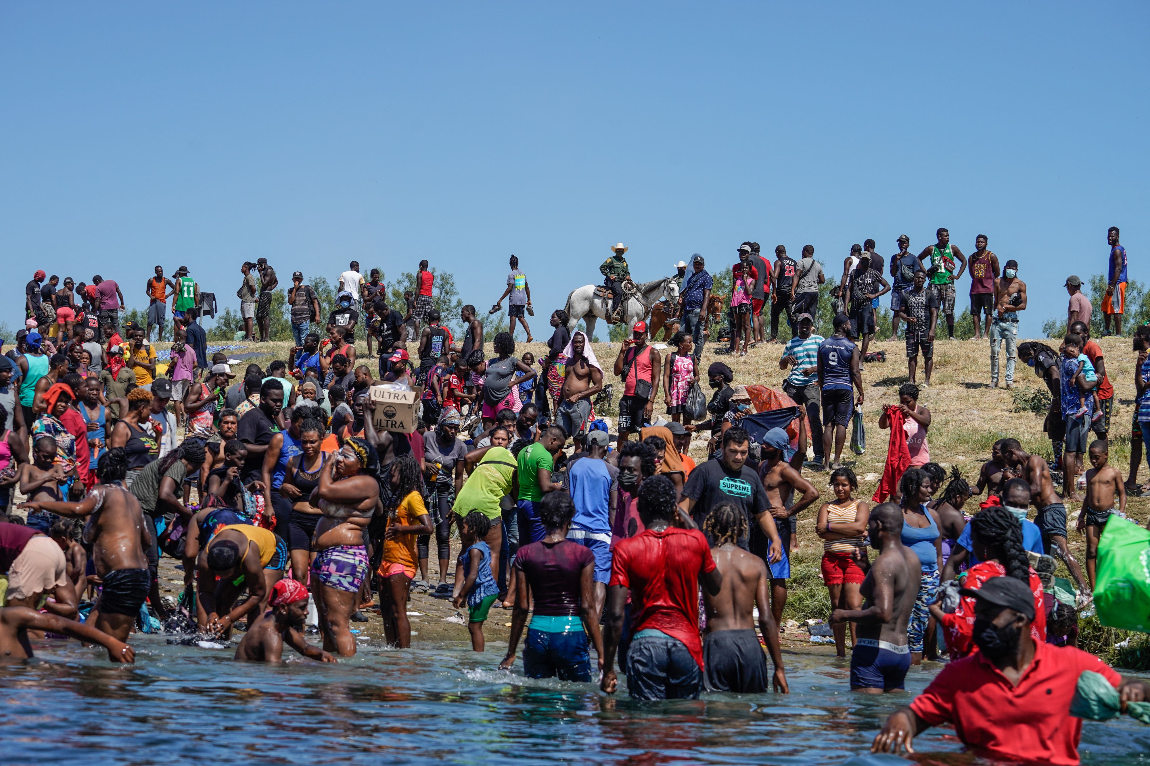 Tens of thousands of people arrived at the US border and camped out near the Acuna Del Rio International Bridge in Del Rio, Texas, as pictured on 19 September.