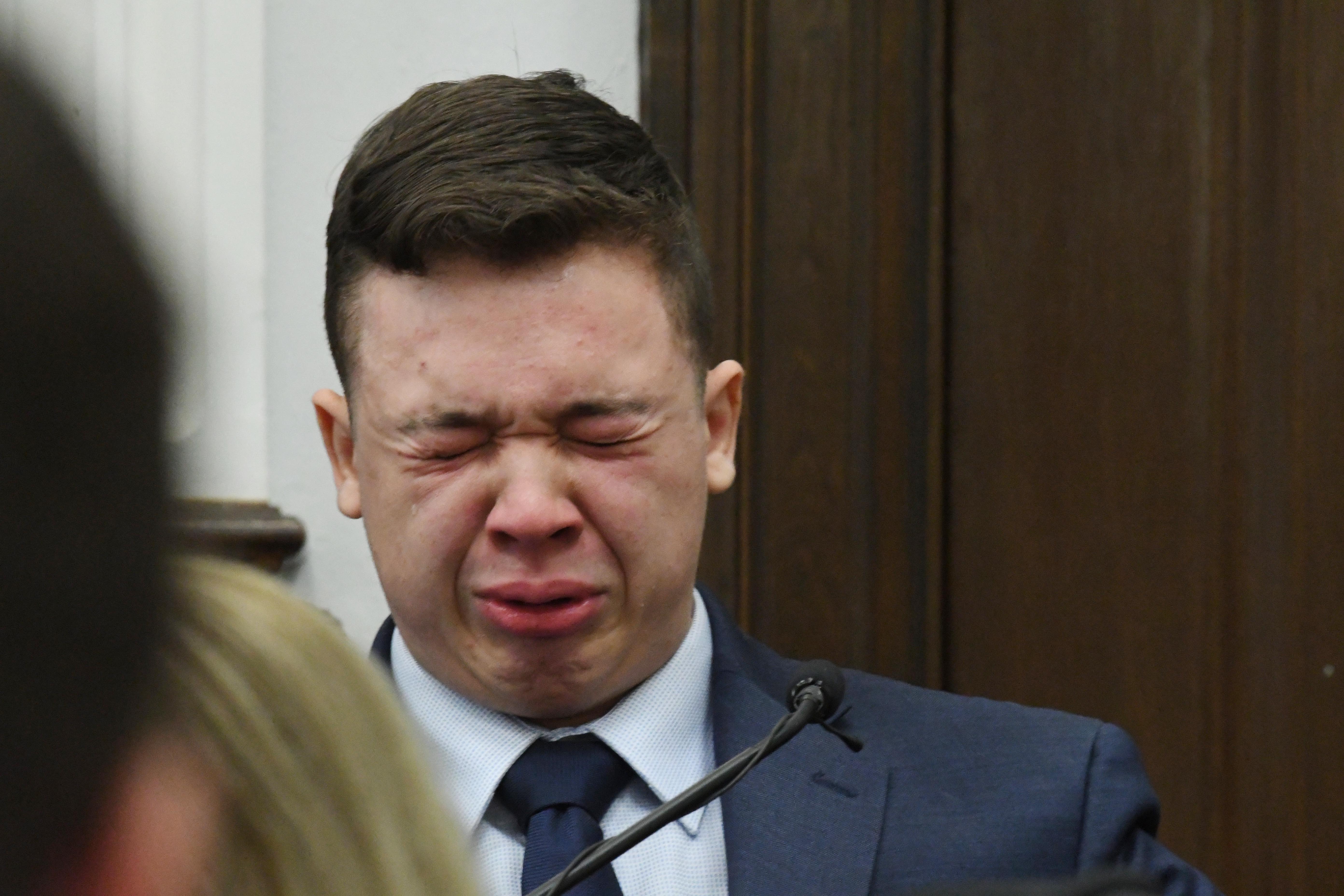 Kyle Rittenhouse becomes emotional as he testifies during his trial at the Kenosha County Courthouse on 10 Novemberl. He was later acquitted by a jury.