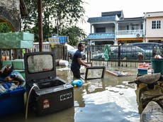 Volunteers bolster Malaysia flood response as prime minister admits lapses in official rescue effort