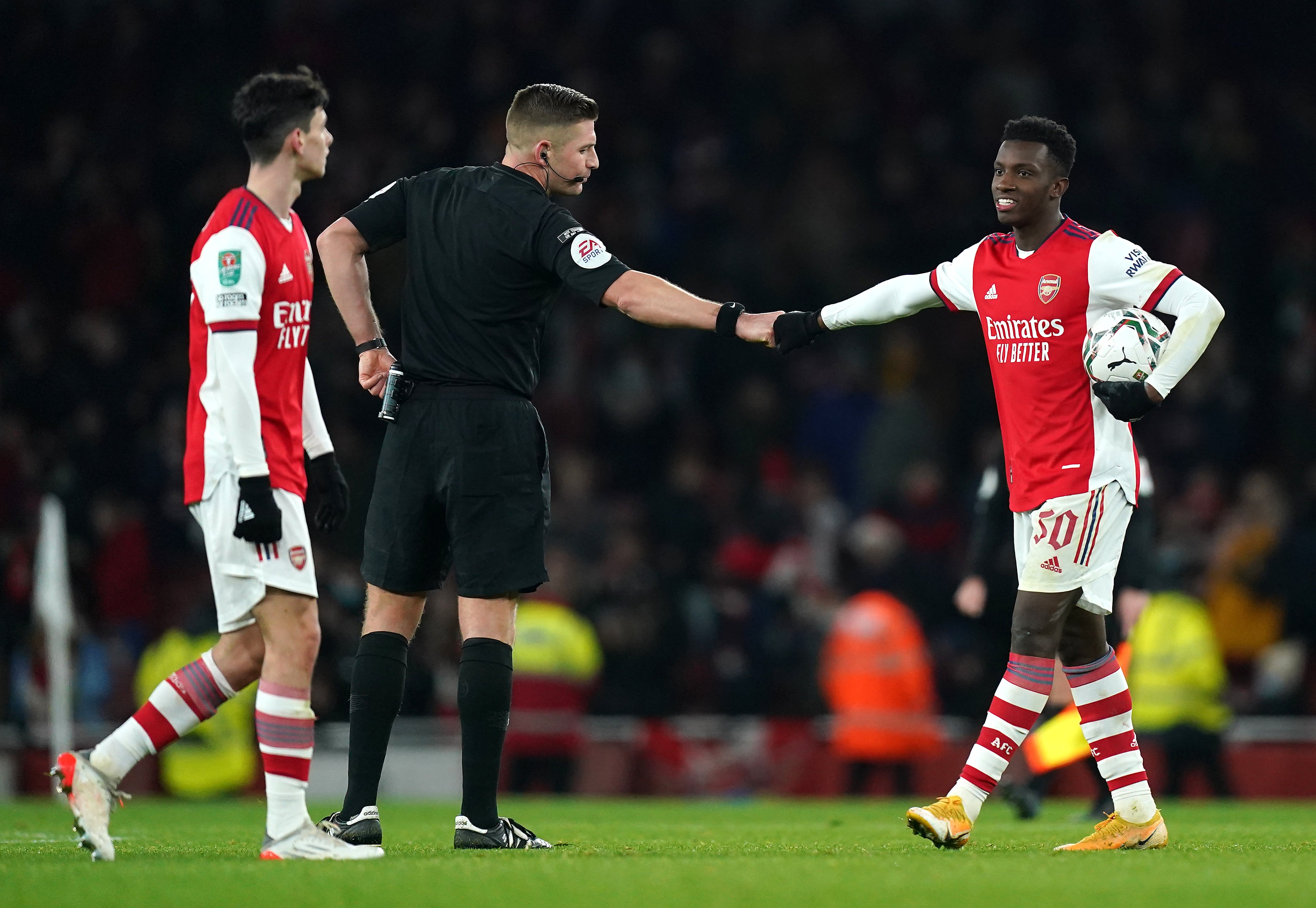 Eddie Nketiah (right) celebrates with the match ball (Mike Egerton/PA)