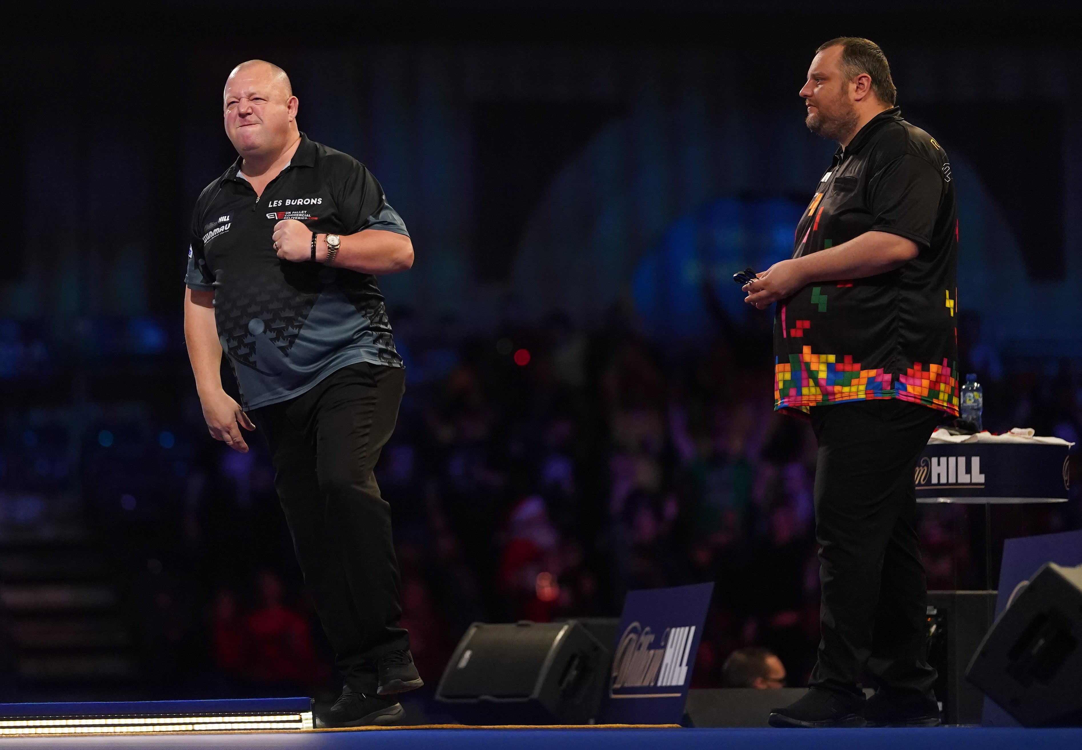 Mervyn King (left) fought back after Ryan Joyce (right) won the opening two sets (Adam Davy/PA)