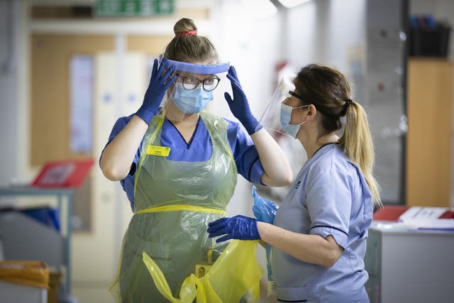 File photo dated 27/01/21 of nurses changing their PPE on Ward 5, a Covid Red Ward, at the Royal Alexandra Hospital in Paisley. Personal protective equipment (PPE) worth �2.8 billion is not fit for purpose and cannot be used by the NHS, a health minister has revealed. Issue date: Friday September 17, 2021.