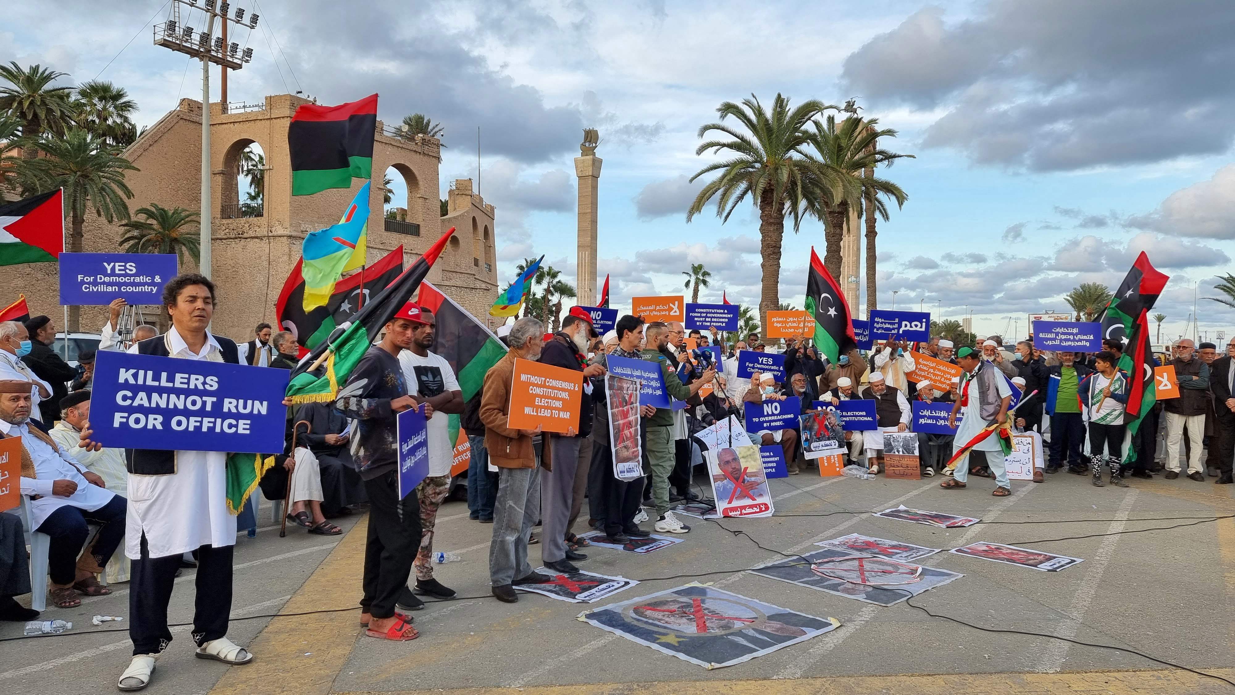 People protest against the candidacy of Seif al-Islam Kadhafi in Libya’s capital Tripoli on 19 November 2021