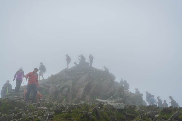 <p>The peak of Snowdon is often busy with walkers </p>