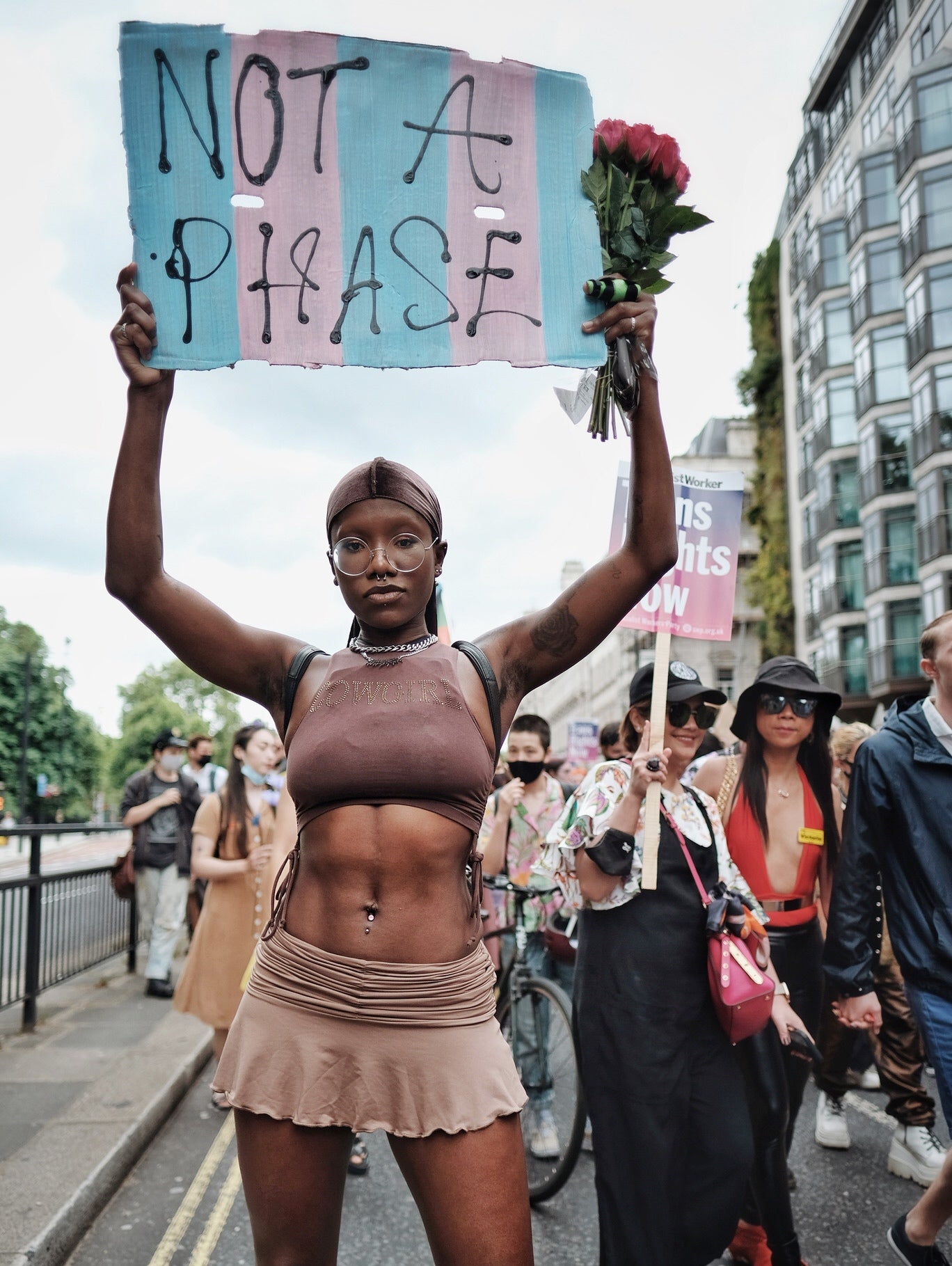 A protester holds a placard at London Trans Pride in June